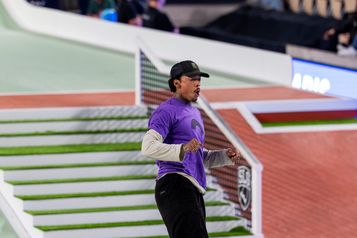 Nyjah Huston celebrates a 9 Club score at SLS Paris 2026 Street League Skateboarding.