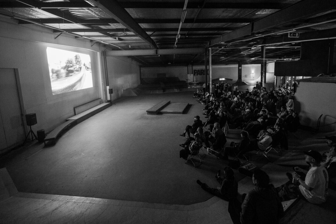 Asics Skateboarding Docu/Style Action Premiere and team session at PARK Amsterdam Black and white photo of the crowd watching the movie during the Asics Skateboarding Docu/Style Action Premiere and team session at PARK Amsterdam at 28 of October 2026.